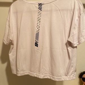 Cropped white New Balance workout shirt